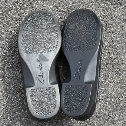 Woman’s  Clarks  Open-back Clog. 7W Black Leather