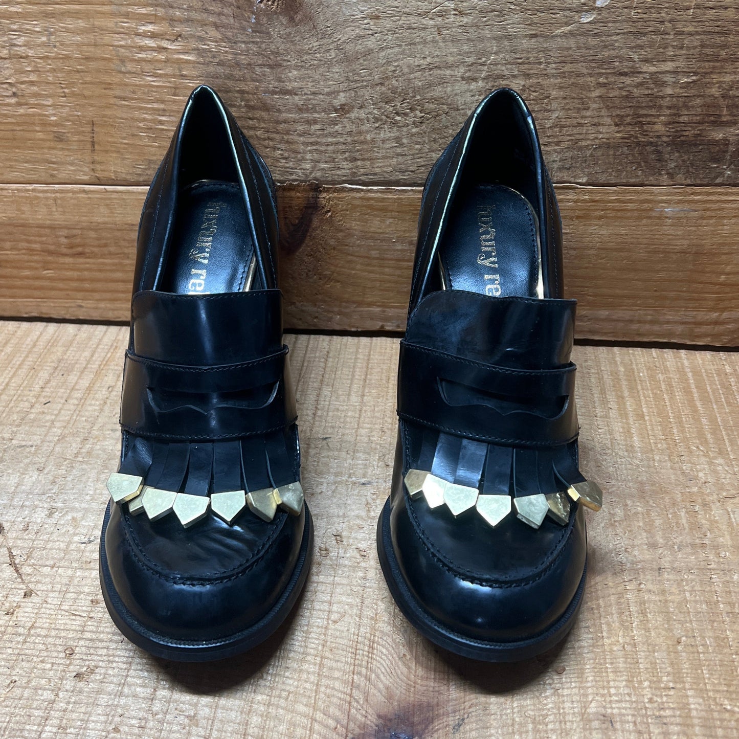 LUXURY REBEL Women's High Healed Gold-tipped Kiltie Penny Loafer Pump. 37EU/US 6.5-7  Black Polished Leather