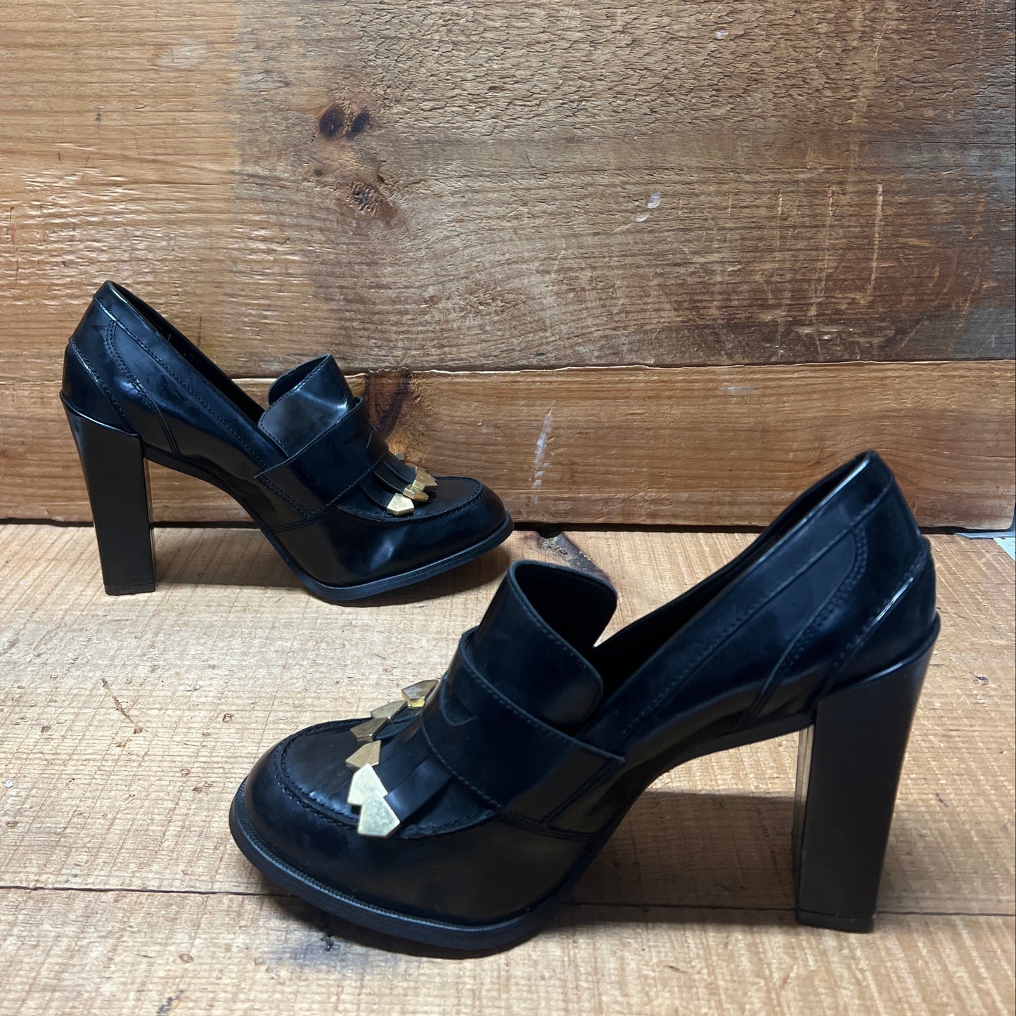 LUXURY REBEL Women's High Healed Gold-tipped Kiltie Penny Loafer Pump. 37EU/US 6.5-7  Black Polished Leather