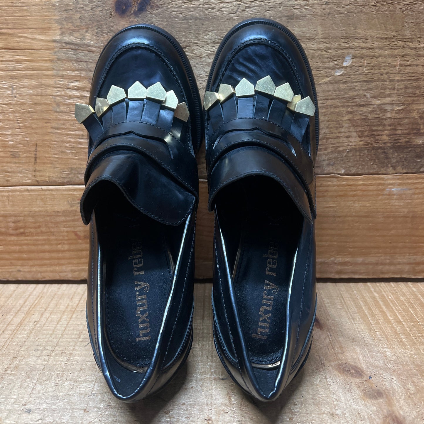 LUXURY REBEL Women's High Healed Gold-tipped Kiltie Penny Loafer Pump. 37EU/US 6.5-7  Black Polished Leather